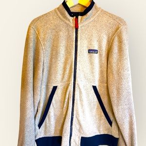 Patagonia men’s small vintage cream/gray with blue trim zip up jacket.